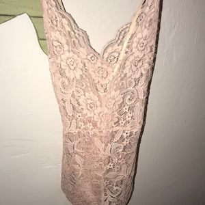 NWOT lace bodysuit w/ crossed back